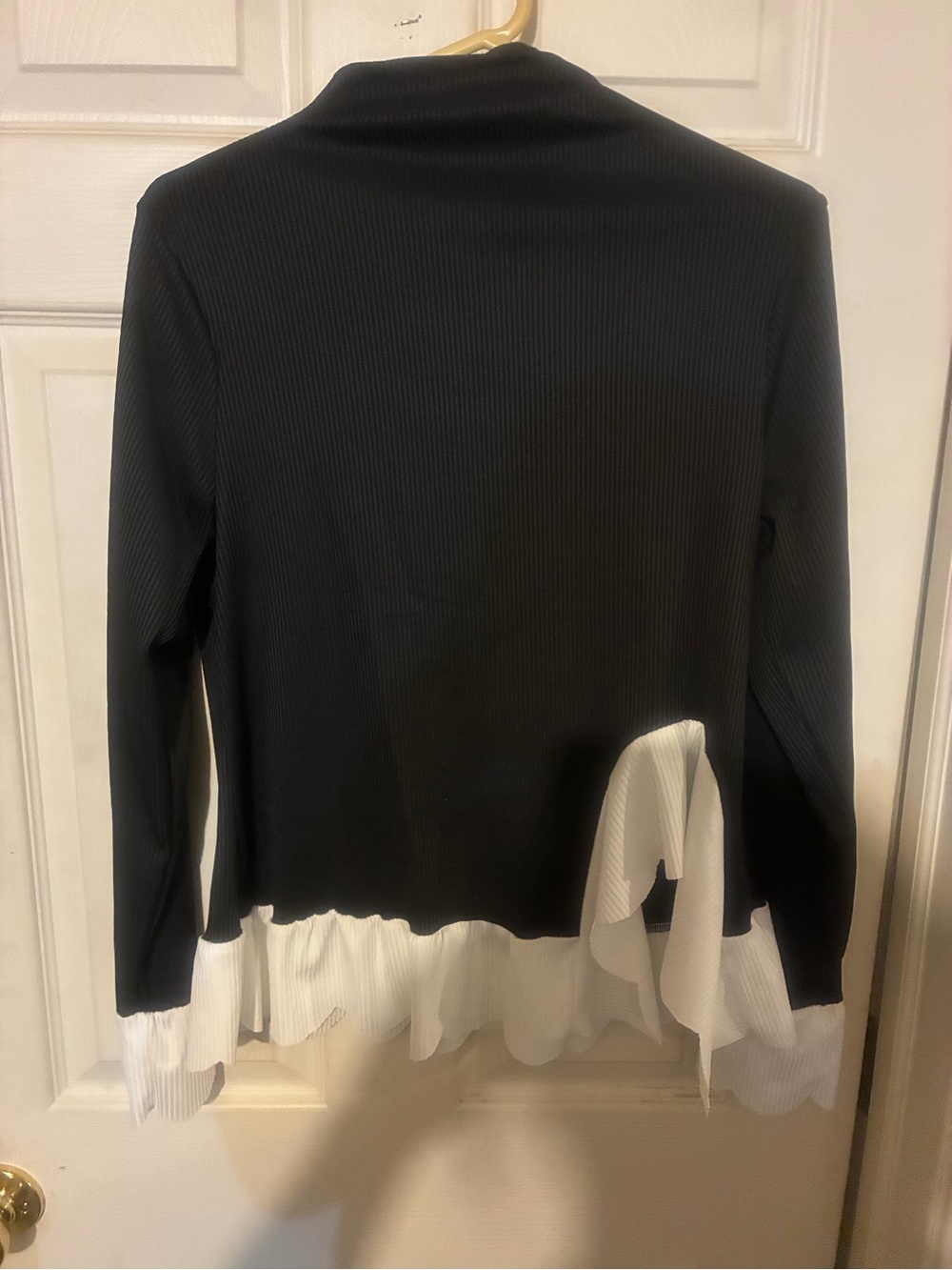 Black Long Sleeve Ruffle-Hem Ribbed Top - Two-Tone Style